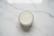 Load image into Gallery viewer, Top view of a jar of Tallow Butter on a marble surface.