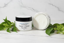 Load image into Gallery viewer, Mango & Coconut Body Butter jar with lid off on a textured surface