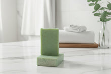Load image into Gallery viewer, Tallow Goat Milk Soap - Just Breathe displayed on a marble countertop with white towels and greenery.