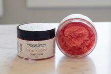 Load image into Gallery viewer, Two jars of Wildflower Soapary products on a textured white background