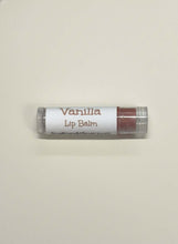 Load image into Gallery viewer, Vanilla Beeswax Lip Balm in a clear tube, perfect for moisturizing dry lips.