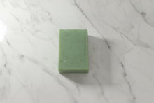 Load image into Gallery viewer, Tallow Goat Milk Soap - Just Breathe displayed on marble surface, highlighting its creamy texture and green color.