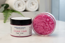 Load image into Gallery viewer, Coconut Colada Tallow Sugar Scrub in a jar with pink sugar scrub visible, promoting tropical skin nourishment.
