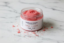 Load image into Gallery viewer, Jar of pink sugar scrub with visible brand name on a textured white background
