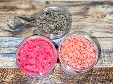 Load image into Gallery viewer, multiple containers of sugar scrub (pink, orange &amp; brown).
