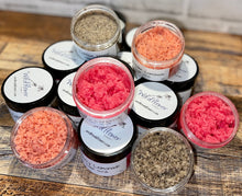 Load image into Gallery viewer, multiple containers of sugar scrub (pink, orange &amp; brown).
