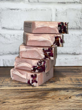 Load image into Gallery viewer, Light pink rose scented soap with rose pedals on top, stacked together
